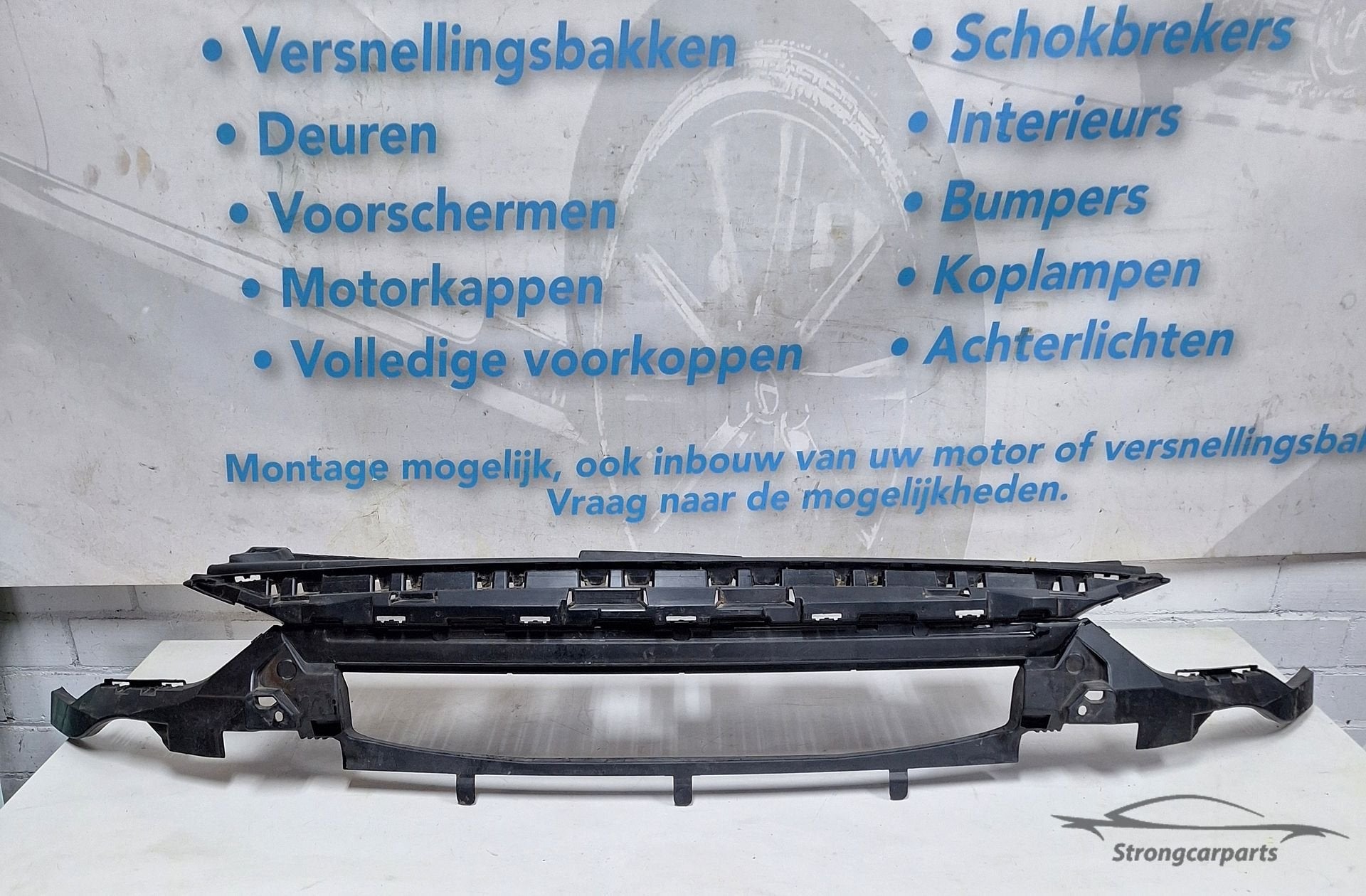 Opel Corsa F Grille houder 9829535680 Origineel, Gebruikt, -, -, Opel