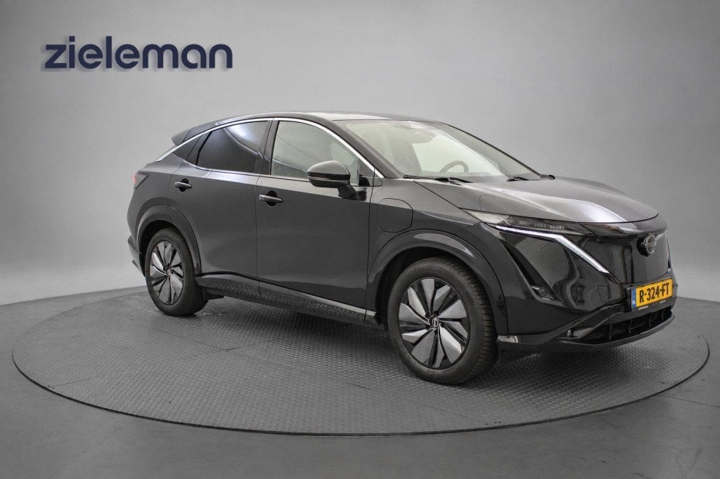 Nissan ARIYA Evolve 66 kWh - Carplay, Camera, Adapt. Cruise,, Auto's, Gebruikt, Met garantie (alle), 40 min, Zwart