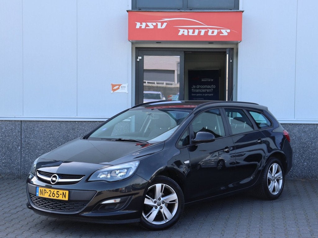Opel Astra Sports Tourer 1.4 Turbo Business + airco LM *123., Auto's, Voorwielaandrijving, Euro 5, 15 km/l, Gebruikt