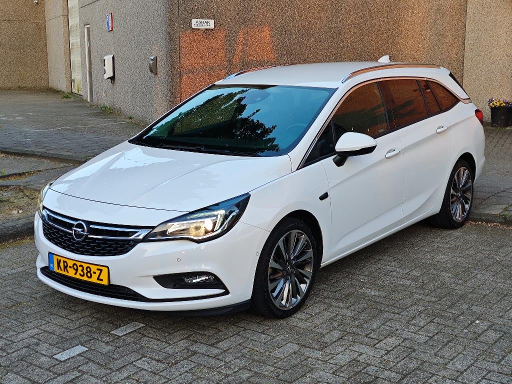 Opel Astra 1.4 Turbo | 150 pk | 18" | Apple Carplay | Camera, Auto's, Voorwielaandrijving, 4 cilinders, Leder en Stof, Wit
