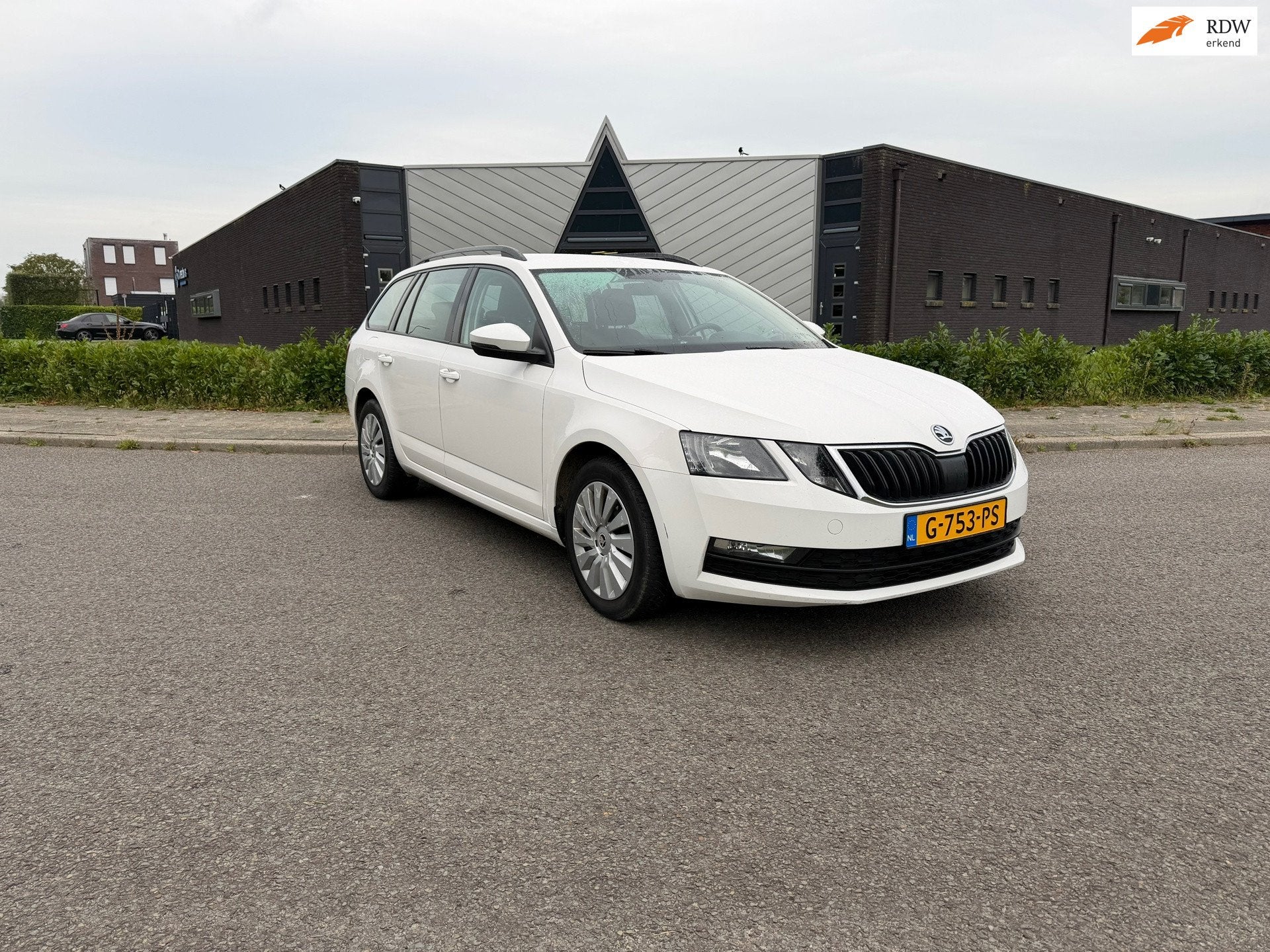 Skoda Octavia Combi 1.6 TDI Greentech Ambition, Auto's, Voorwielaandrijving, Gebruikt, 116 pk, Wit