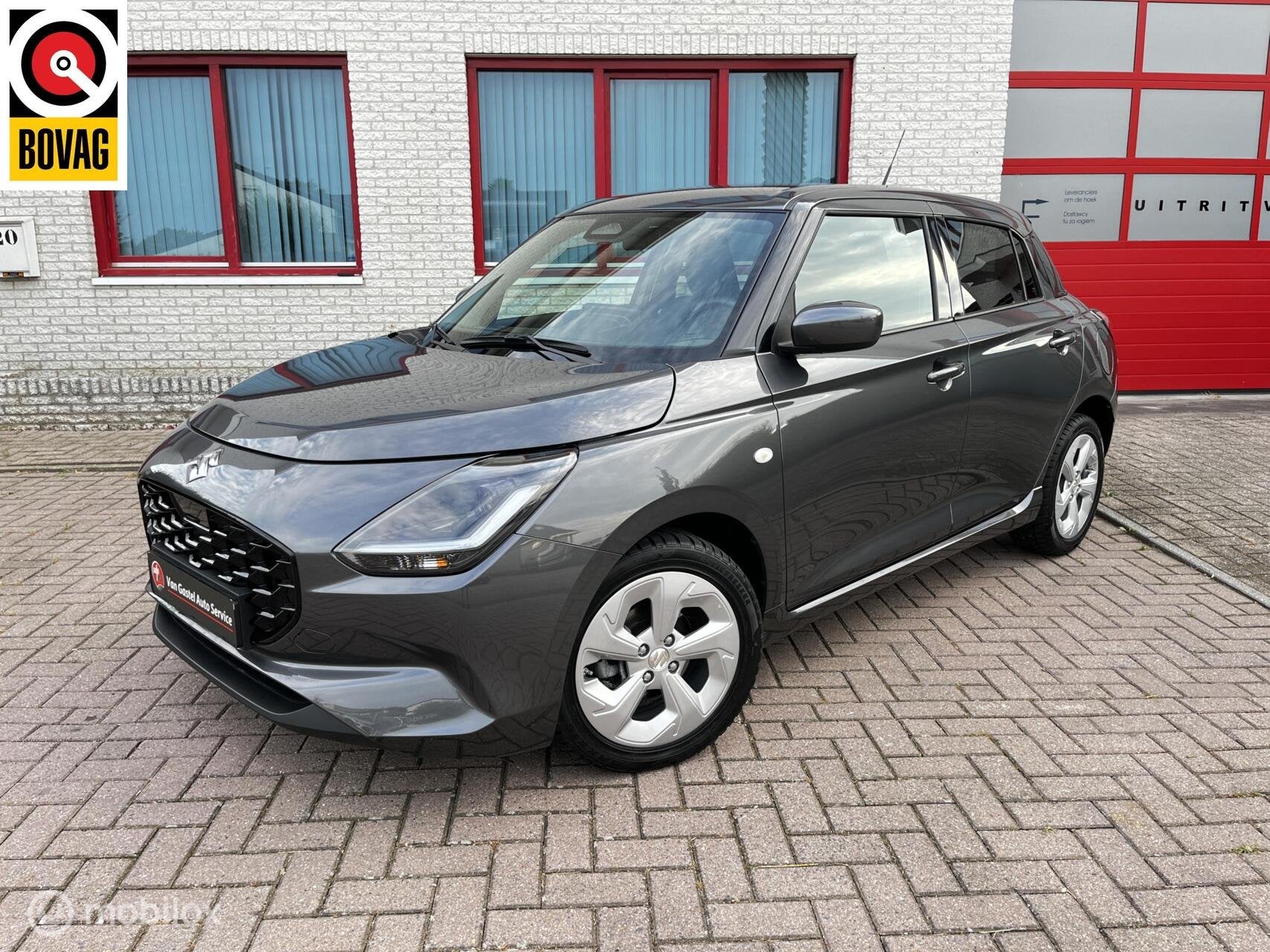 Suzuki Swift 1.2i Smart Hybrid AUTOMAAT/NAVI/CAMERA, Auto's, 83 pk, Stof, Gebruikt, Zwart
