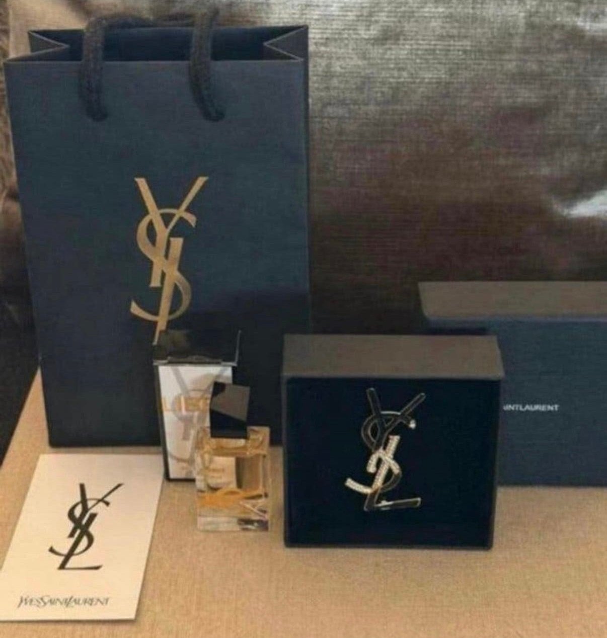 Stijlvolle YSL broche, zwart/goud & miniatuur Libre in tas, Verzenden, Zo goed als nieuw, Miniatuur