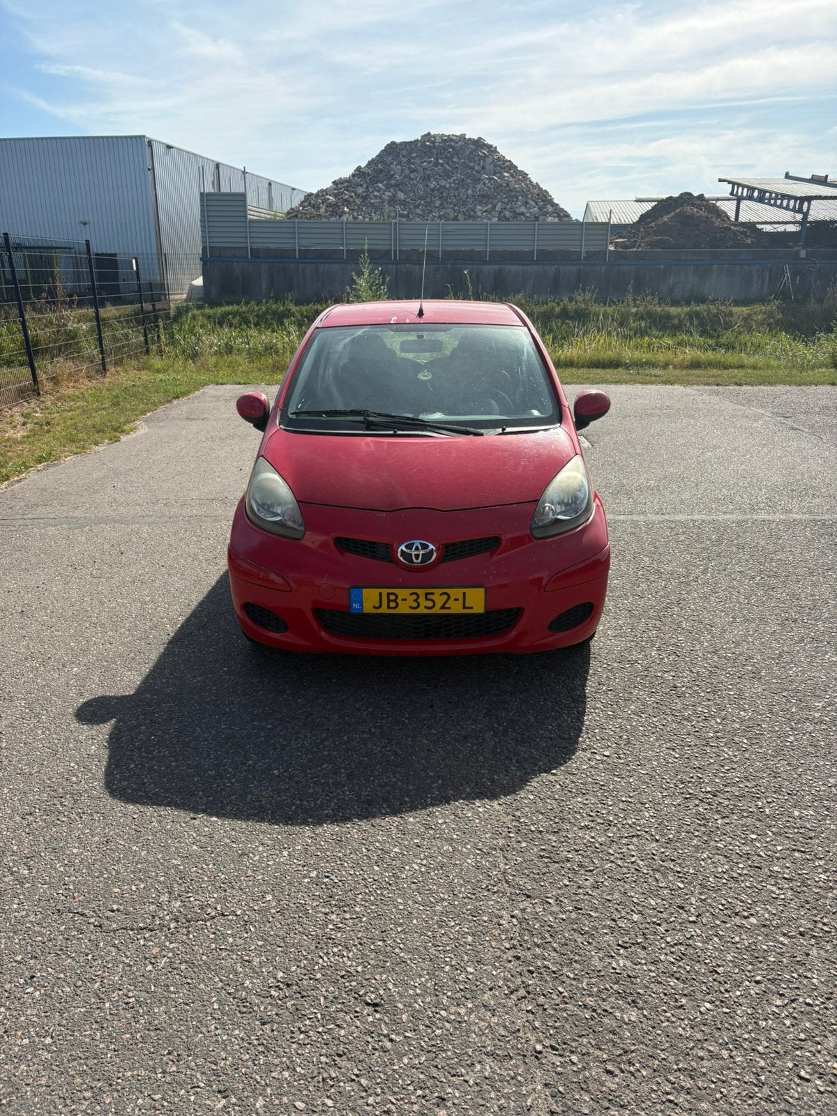 Toyota Aygo 1.0 12V Vvt-i 3DRS MMT 2009 Rood, Auto's, Voorwielaandrijving, 4 stoelen, 68 pk, Handgeschakeld