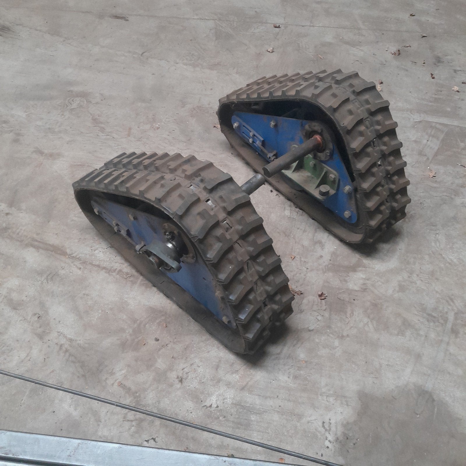 Rubber track. Rupsbanden, Ophalen, Onderdeel