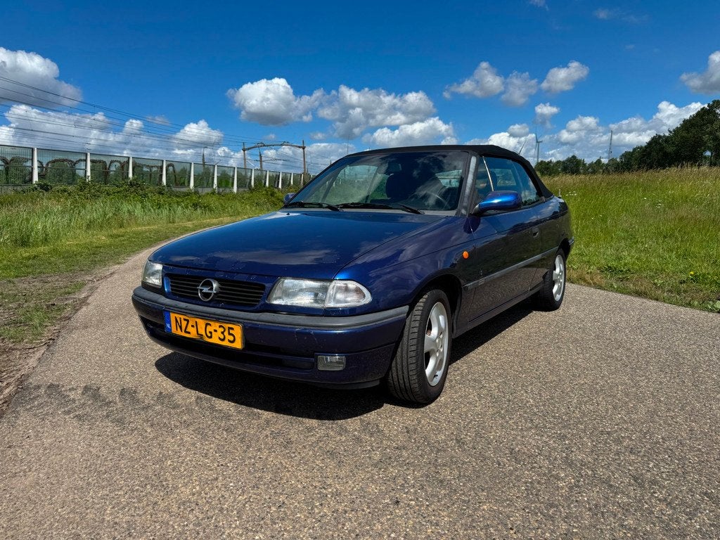 Opel Astra Cabriolet 1.6i Comfort | Zo goed als nieuw dak! |, Gebruikt, 4 cilinders, Cabriolet, Blauw