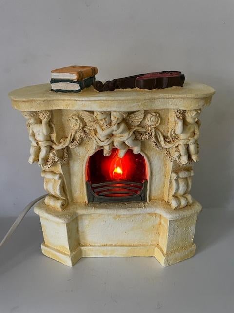 Vintage kerstversiering. Mini openhaard vlamlampje., Ophalen