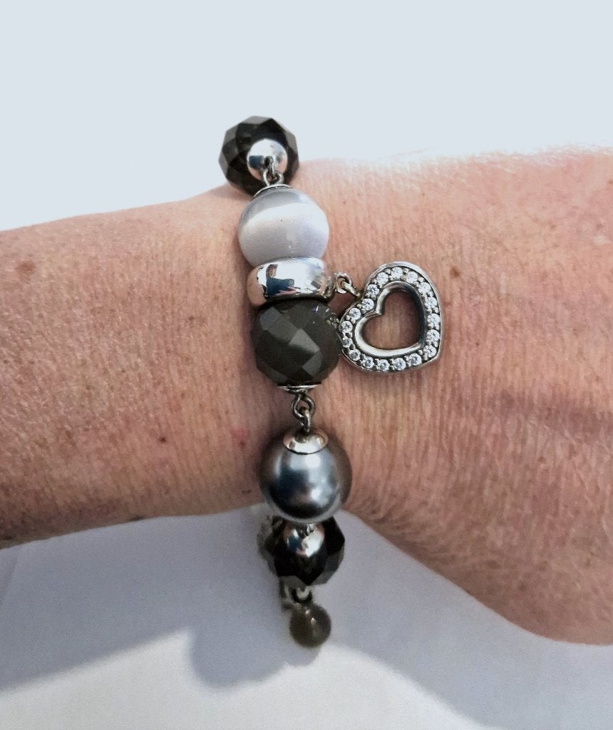 Prachtige TI SENTO zilveren (925) armband met diverse BEDELS, Ophalen, Zo goed als nieuw, Met bedels of kralen, Zilver