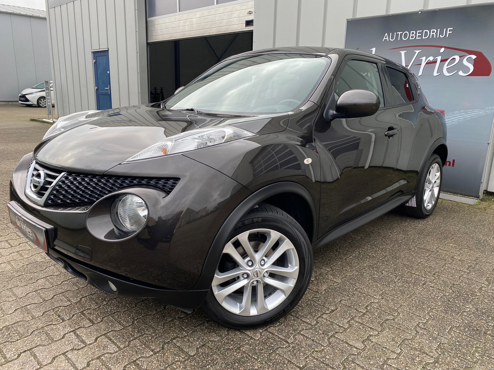 Nissan Juke 1.6 Tekna / Clima / Cruise / Navi / Camera / LMV, Auto's, Voorwielaandrijving, Gebruikt, 4 cilinders, Bruin