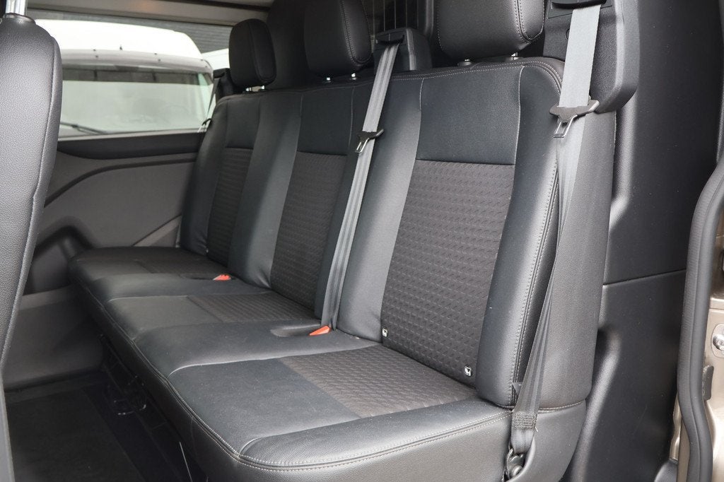 Ford Transit Custom 2.0 TDci 170pk L2 H1 Sport DC (bj 2023), 1998 cc, Gebruikt, Bruin, Leder en Stof