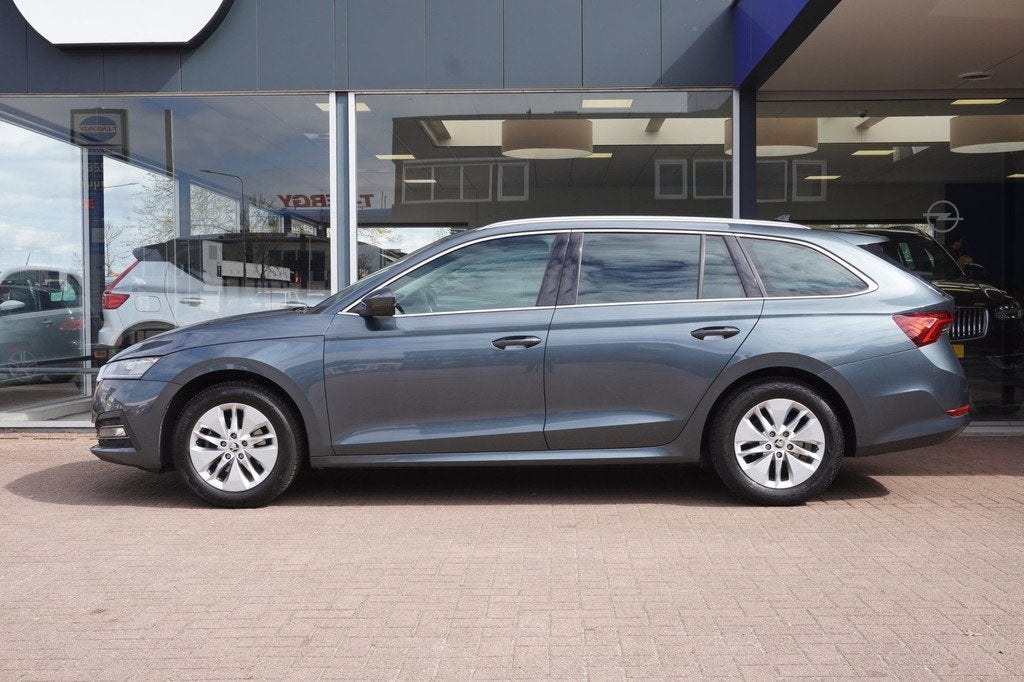 Skoda Octavia Combi 1.0 TSI Business Edition Airco | CarPlay, Auto's, Stof, Gebruikt, Euro 6, Origineel Nederlands