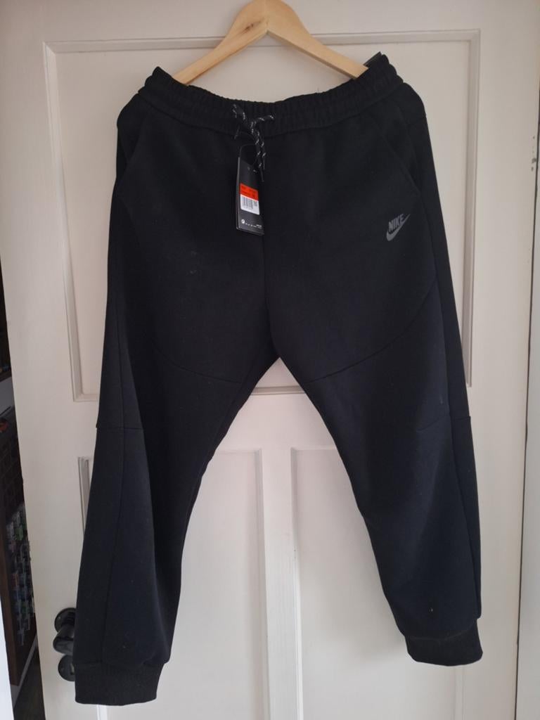 Nike broek M loose fit, Ophalen of Verzenden, Nieuw, Blauw, W32 (confectie 46) of kleiner