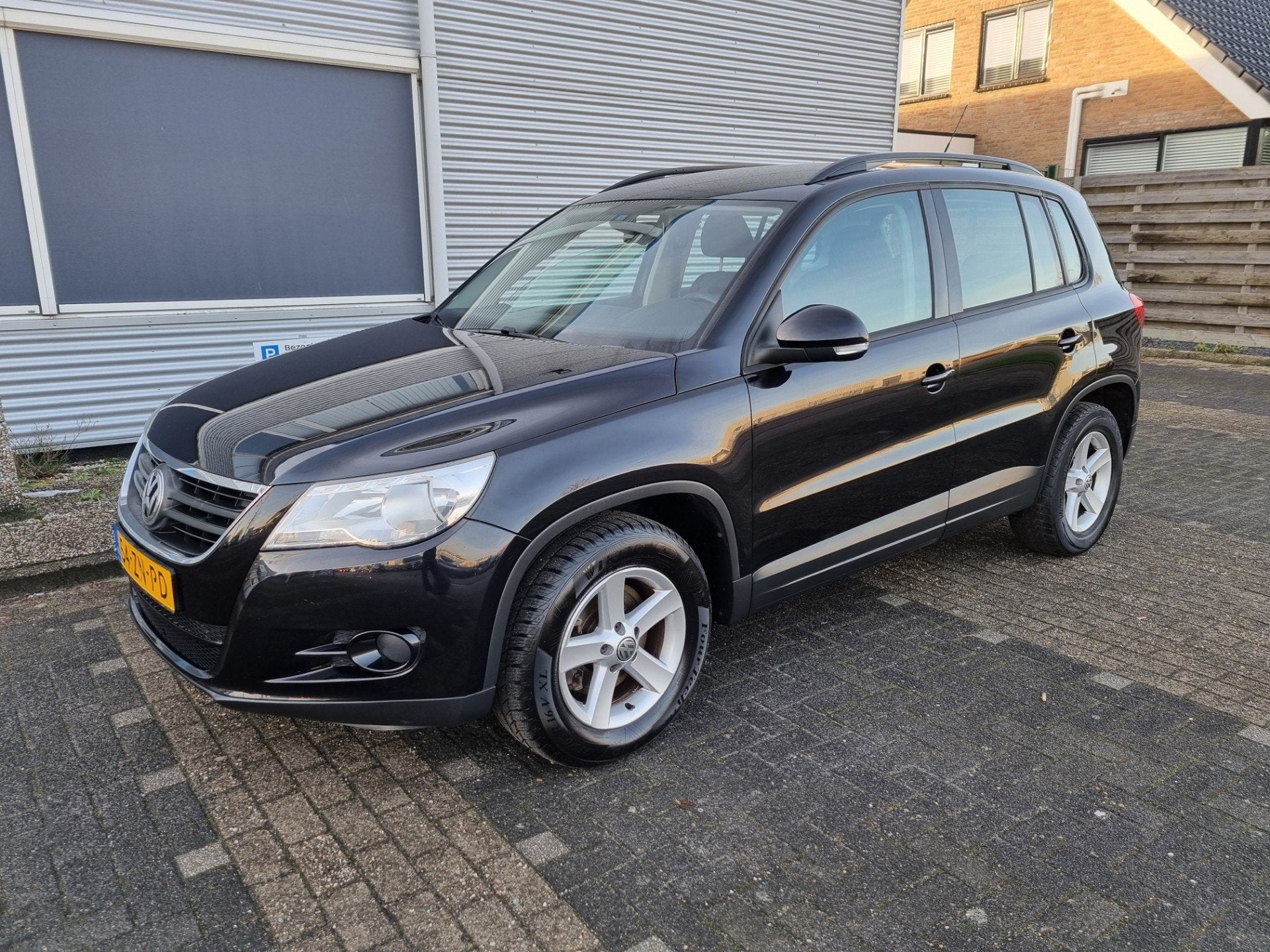 Volkswagen Tiguan 1.4 TSI Comfort&Design 4Motion Clima Bj:20, Gebruikt, 4 cilinders, Zwart, Origineel Nederlands