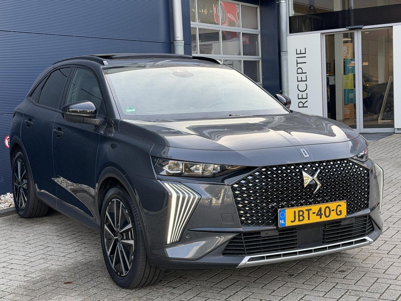 DS DS 7 1.6 PHEV 300 4x4 Pallas Schuifkanteldak | Lederen be, Auto's, Automaat, Gebruikt, 4 cilinders, Leder en Stof