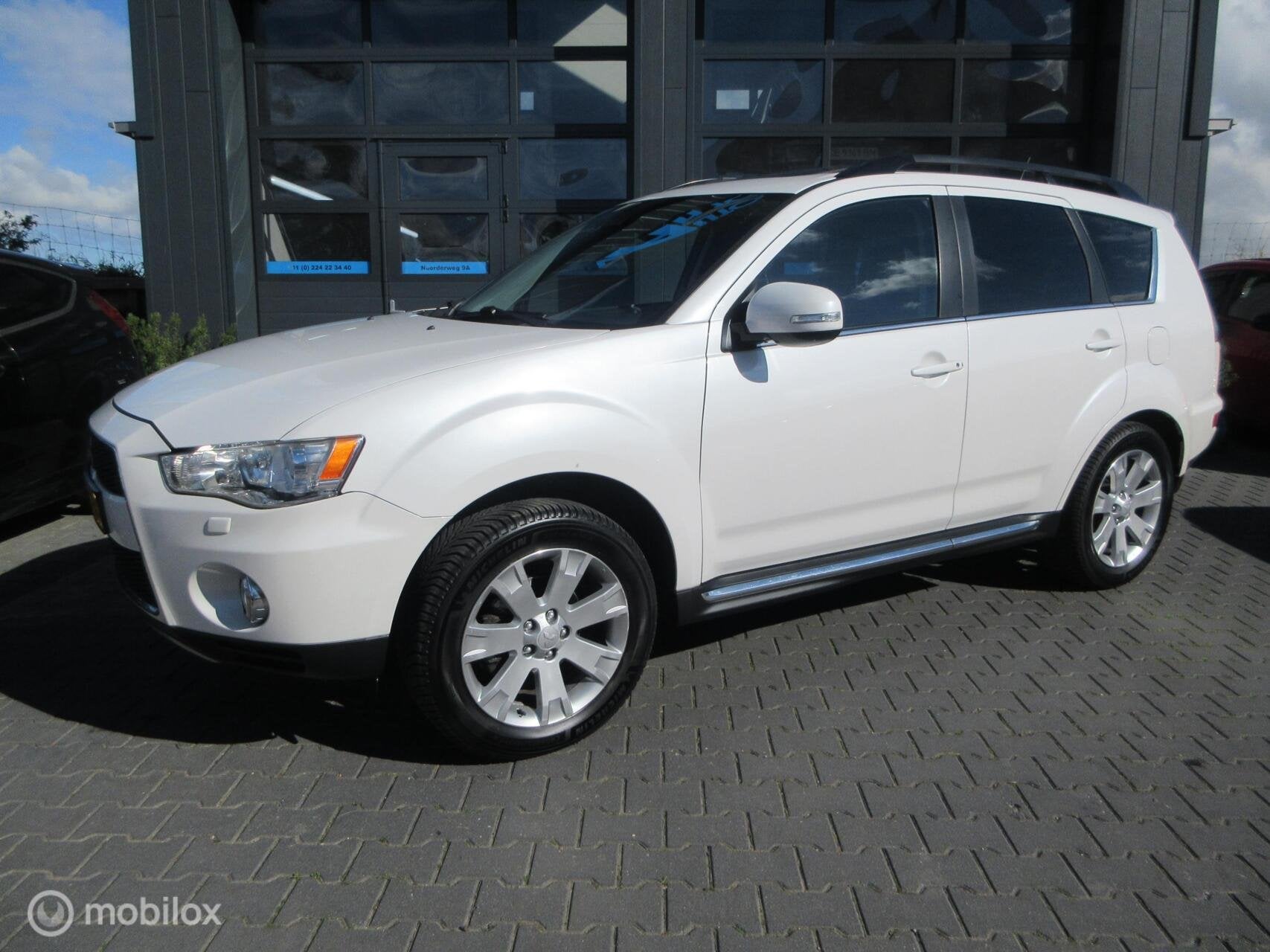 Mitsubishi Outlander 2.0 Edition Two Aut 179dkm Handgas en r, Auto's, Zwart, 4 cilinders, Wit, 1600 kg