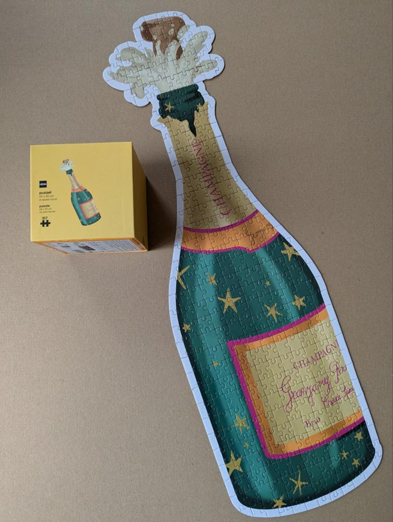 Puzzel champagnefles (317 stukjes, Hema), Ophalen of Verzenden, Minder dan 500 stukjes, Zo goed als nieuw, Legpuzzel
