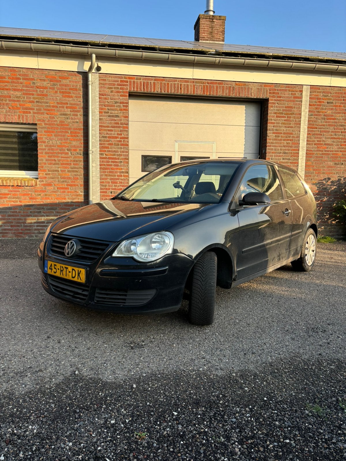 Volkswagen Polo 1.4 55KW 2005 Zwart, Auto's, Voorwielaandrijving, 15 km/l, 74 pk, Zwart