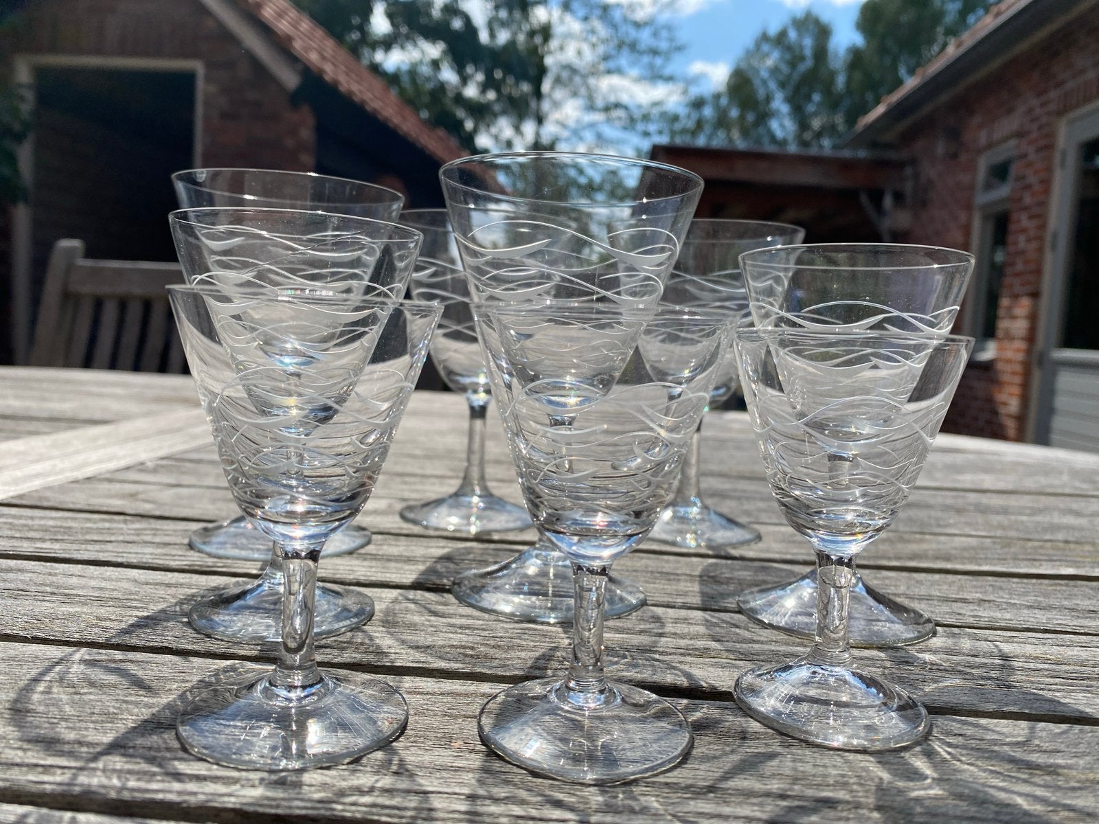 Set van 9 vintage glazen met gegraveerd patroon, Antiek en Kunst, Ophalen