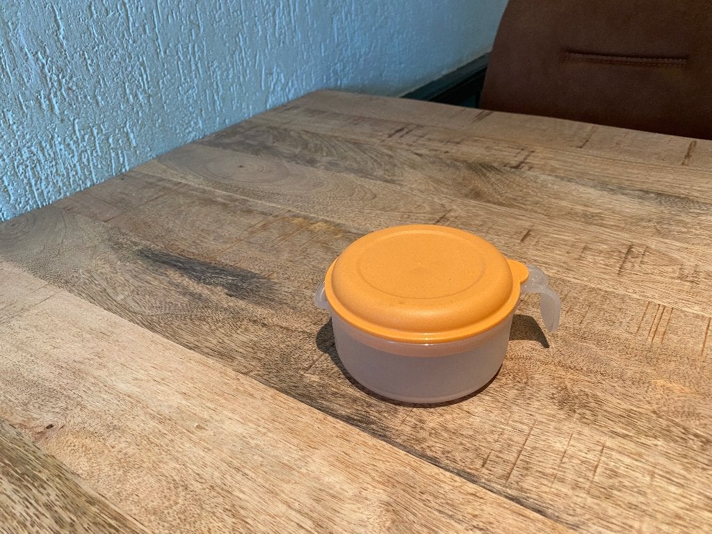 Tupperware Schenkkannetje ( oranje deksel ), Ophalen of Verzenden, Gebruikt, Oranje, Overige typen