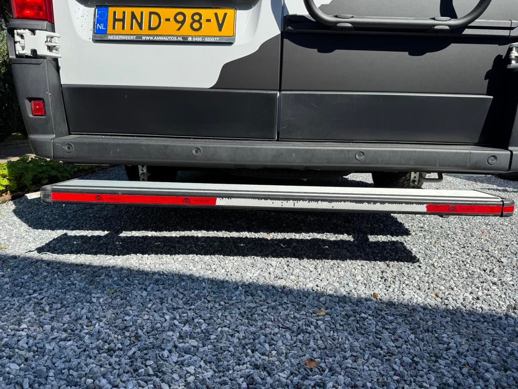 Achteropstap bestelbus, Ophalen