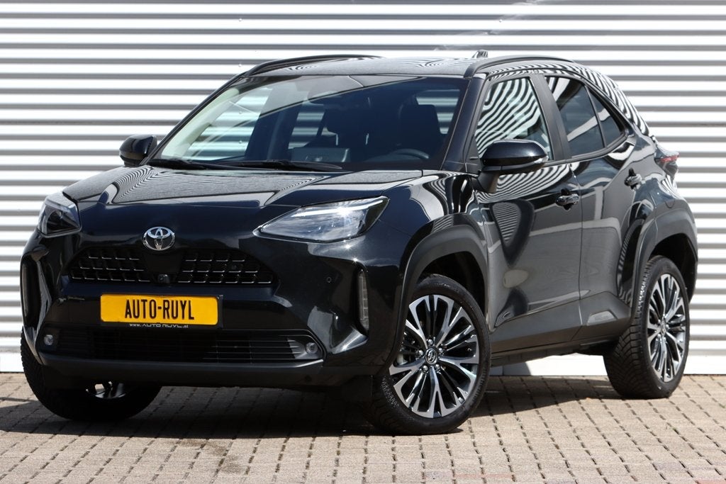 Toyota Yaris Cross 1.5 Hybrid 130 Executive (bj 2024), 1195 kg, Gebruikt, Zwart, Leder en Stof
