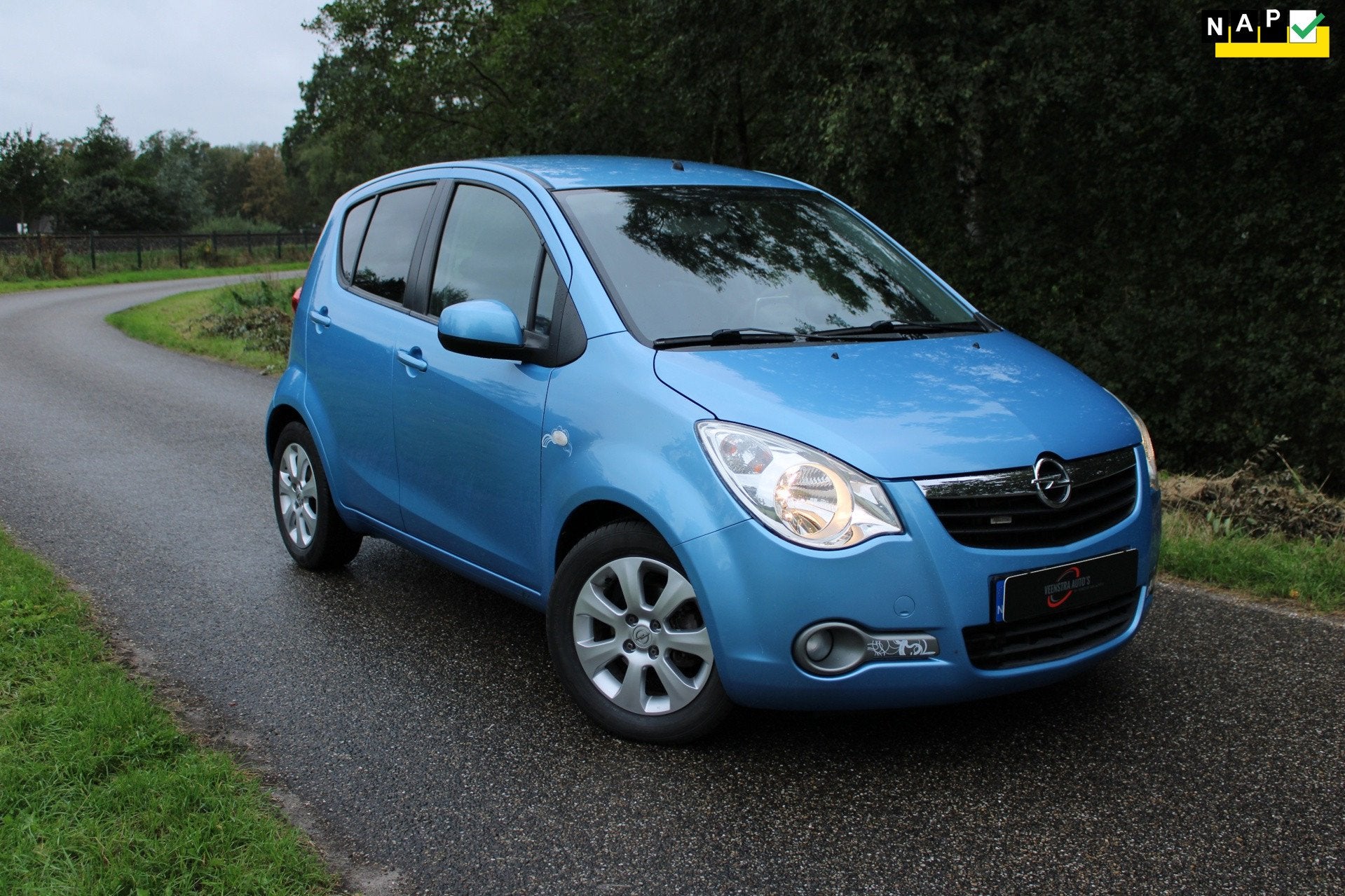 Opel Agila 1.2 Enjoy Agilacom Uniek 15/50 Navi, Airco, NAP!, Auto's, Voorwielaandrijving, 4 cilinders, 965 kg, Blauw