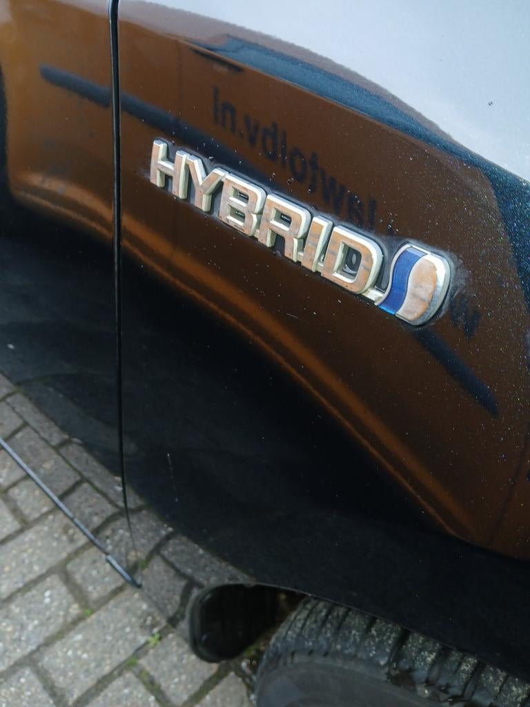 Te koop Toyota auris hybrid, Auto's, Toyota, Stof, Zwart, Navigatiesysteem, Auris
