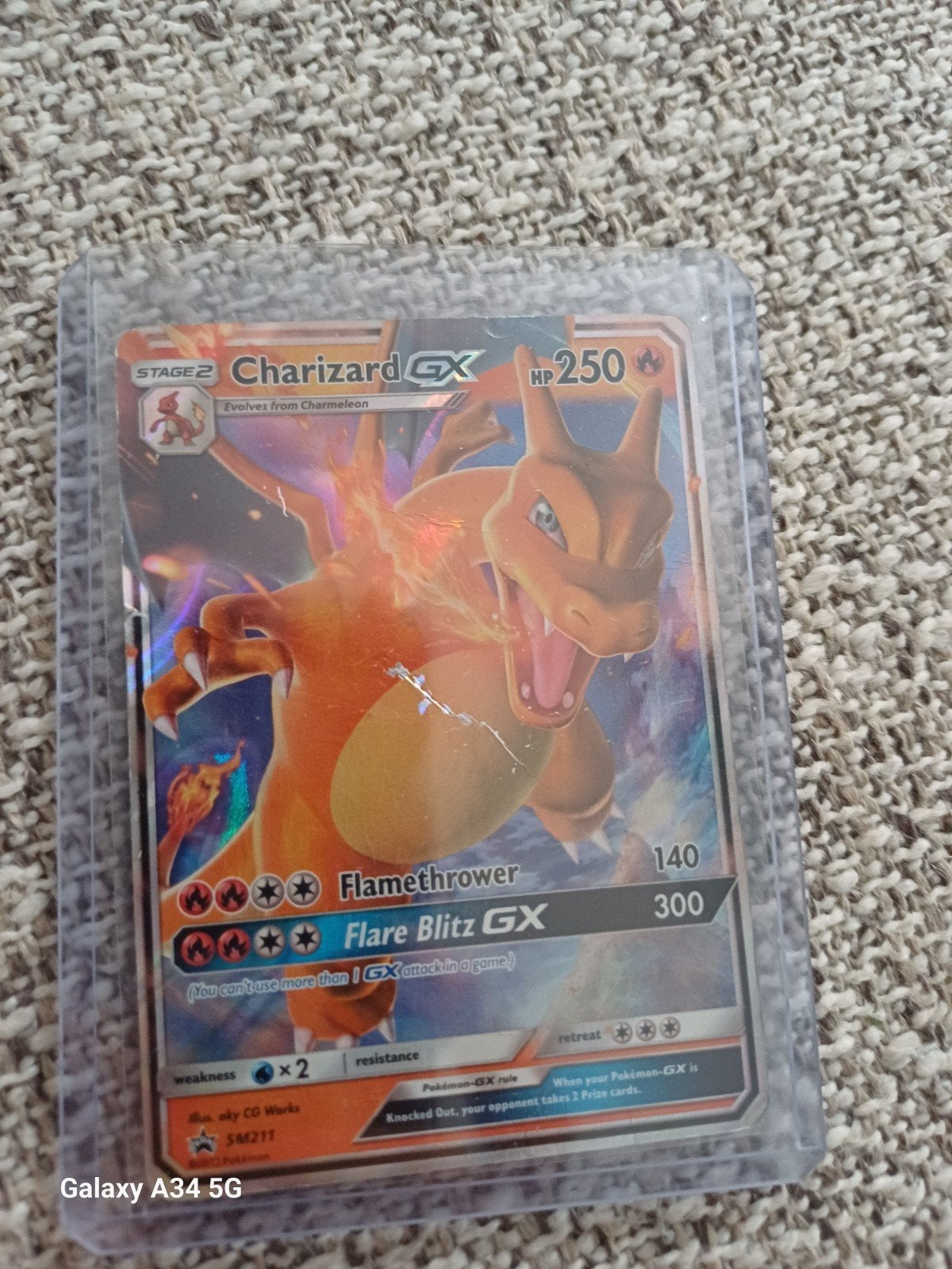 Charizard GX HP 250 Pokémon kaart + gratis hoesje!, Ophalen of Verzenden, Gebruikt, Losse kaart