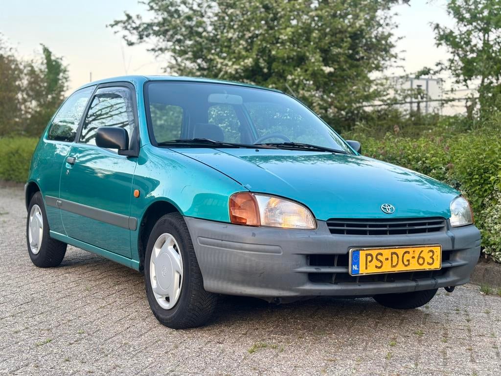 Toyota Starlet 1.3 AUTOMAAT Trekhaak NEW APK 2027 NAP, Auto's, Toyota, Stof, 4 cilinders, Starlet, 400 kg