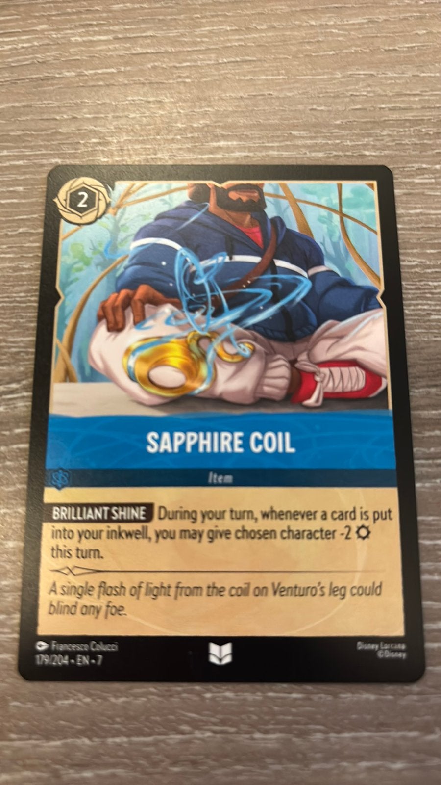 Disney Lorcana Sapphire Coil 179-204 7ARI nonfoil, Hobby en Vrije tijd, Ophalen of Verzenden, Zo goed als nieuw