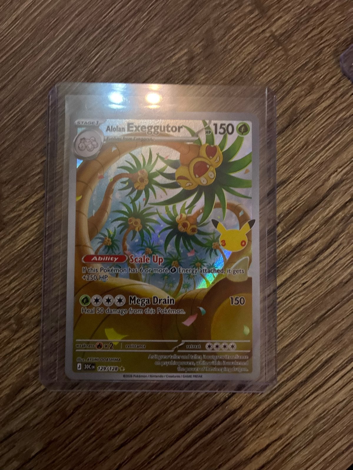 Alolan Exeggutor 120/124 Pokemon Kaart Celebrations, Ophalen of Verzenden, Zo goed als nieuw, Losse kaart, Foil