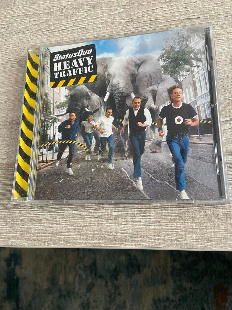 Status Quo - Heavy Traffic CD, Ophalen of Verzenden, Zo goed als nieuw