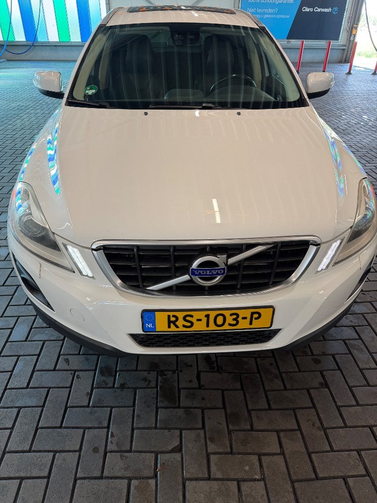 Volvo XC60 2.4 D AWD Geartronic 2010 Wit, Auto's, Volvo, Zwart, 2000 kg, Leder, Vierwielaandrijving