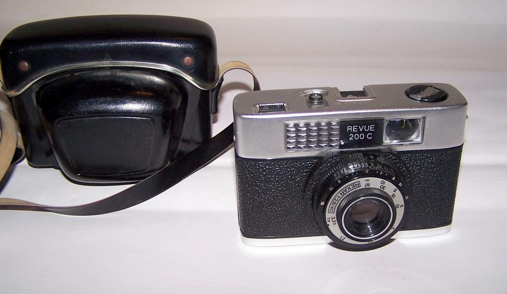 Mooie Revue 200C 35mm camera met leren foudraal. Izgs., Ophalen of Verzenden, Zo goed als nieuw, Compact, Overige Merken