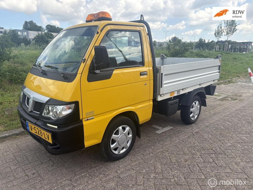 Piaggio Porter 1.3 Kipper SL Extra 1E EIGENAAR 72000 KM NAP, Auto's, Gebruikt, Euro 6, 4 cilinders, 400 kg