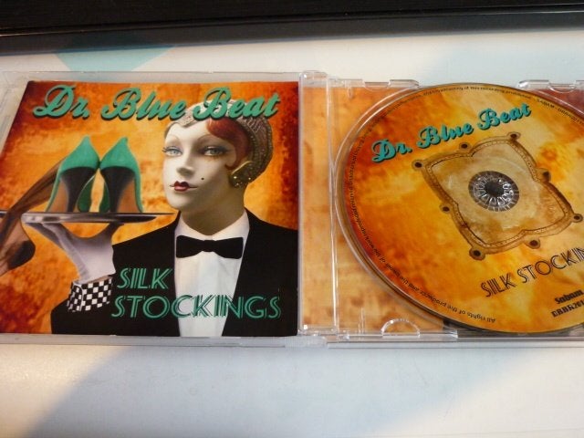 Dr. Blue Beat - Silk Stockings CD, Inclusief boekje, Pop, Ophalen of Verzenden, Zo goed als nieuw
