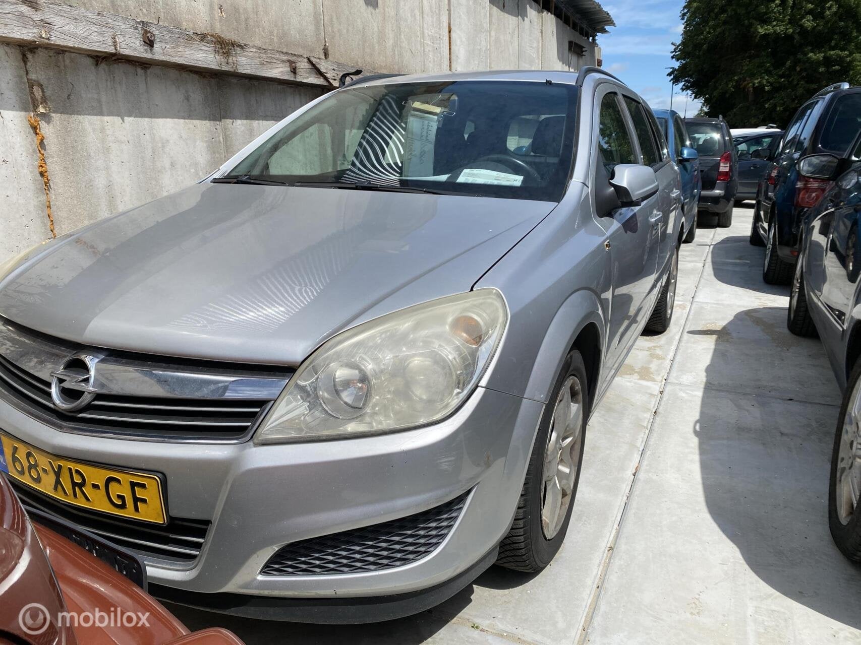Opel Astra Wagon 1.6 Business, Auto's, Voorwielaandrijving, 657 kg, 15 km/l, Gebruikt
