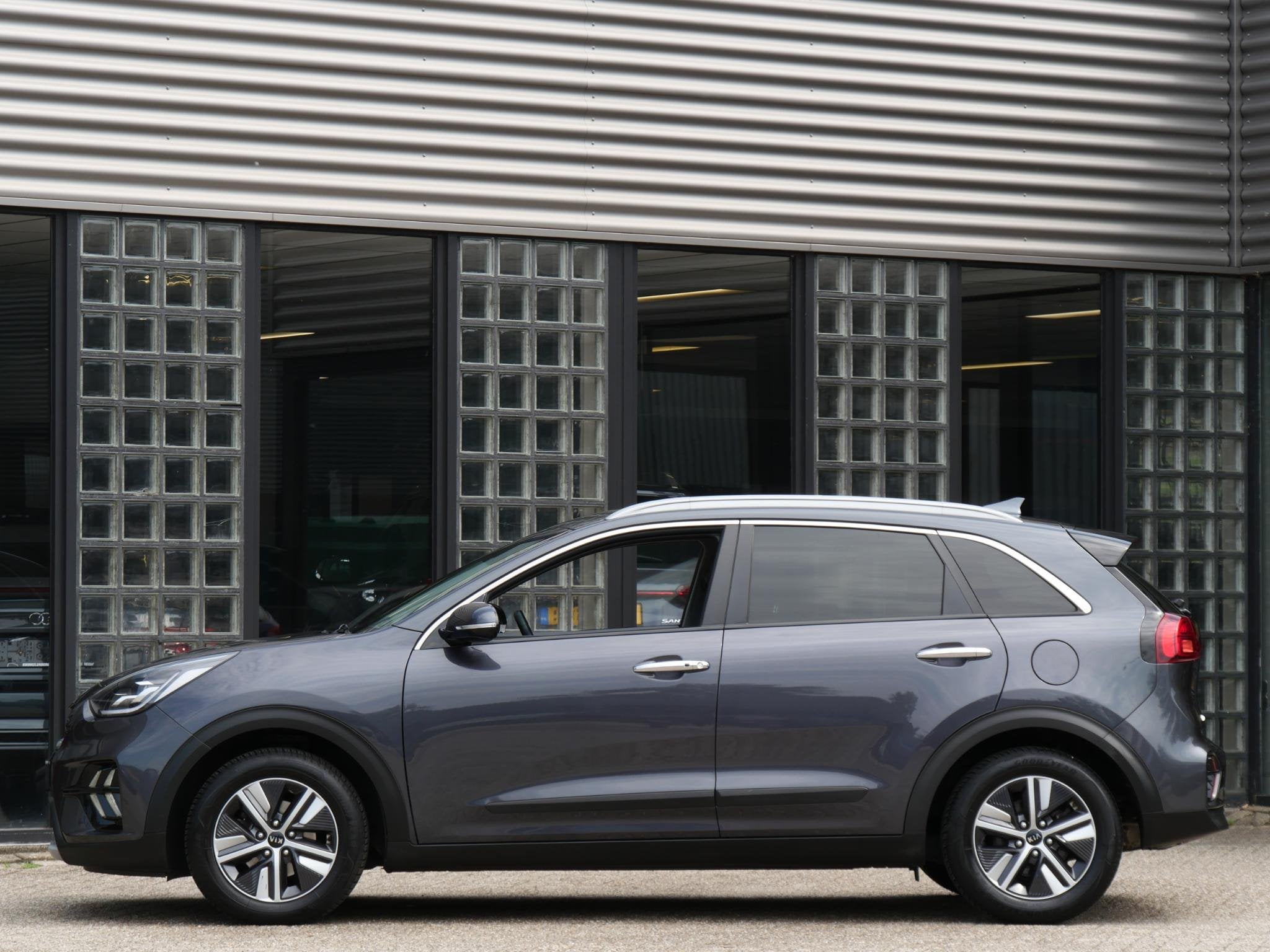 Kia Niro HYBRID PLUSLINE/ AFN. TREKHAAK/ LEER/ NL-AUTO 1STE, Auto's, Gebruikt, 2 kWh, Automatische klimaatregeling, 1390 kg