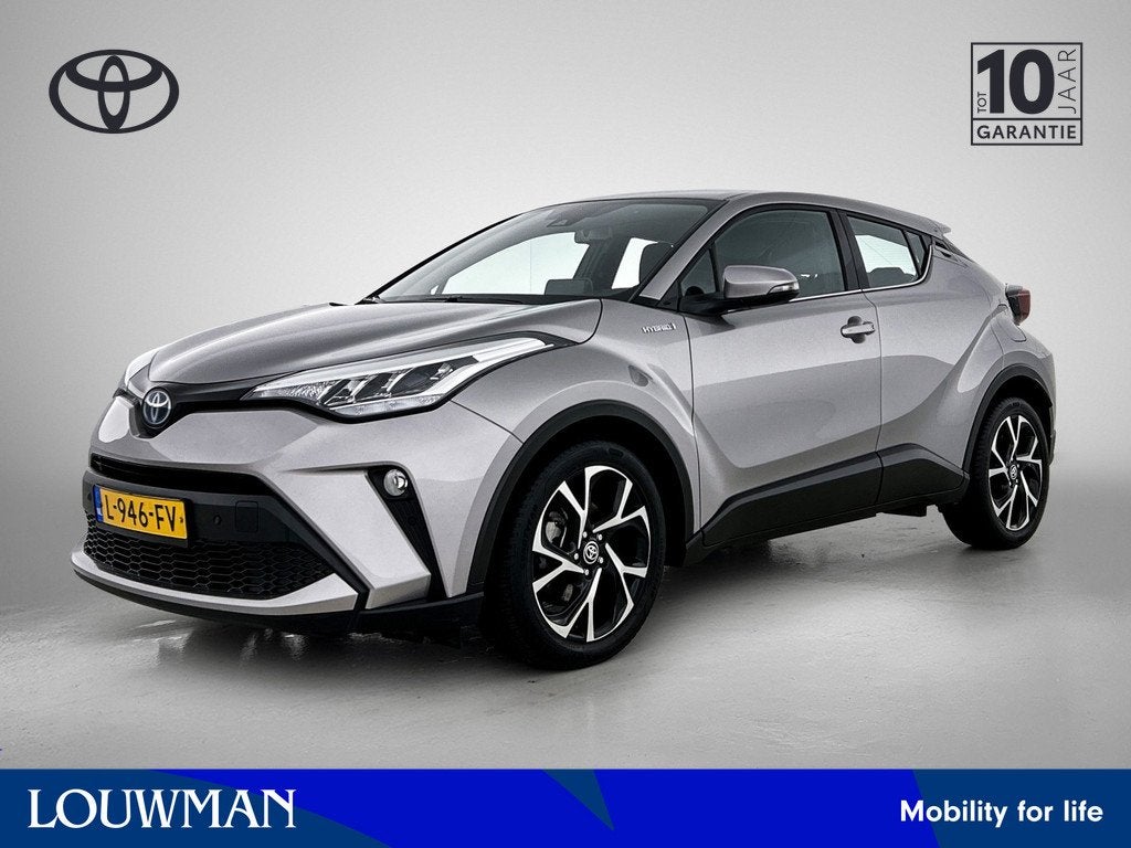 Toyota C-HR 1.8 Hybrid Dynamic | Parkeersensoren | Navigatie, Auto's, Toyota, 12 maanden, Stof, 4 cilinders, 122 pk