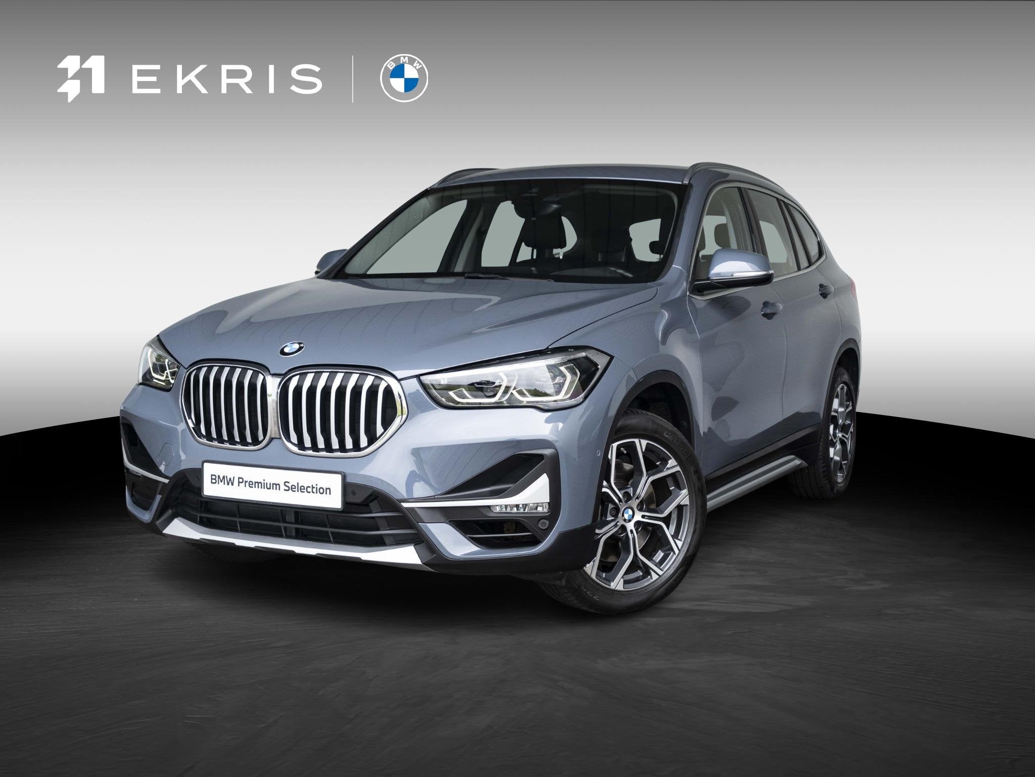 BMW X1 sDrive20i | High Executive | Orange Edition | Achteru, Auto's, BMW, 1998 cc, 4 cilinders, Met garantie (alle), Bedrijf