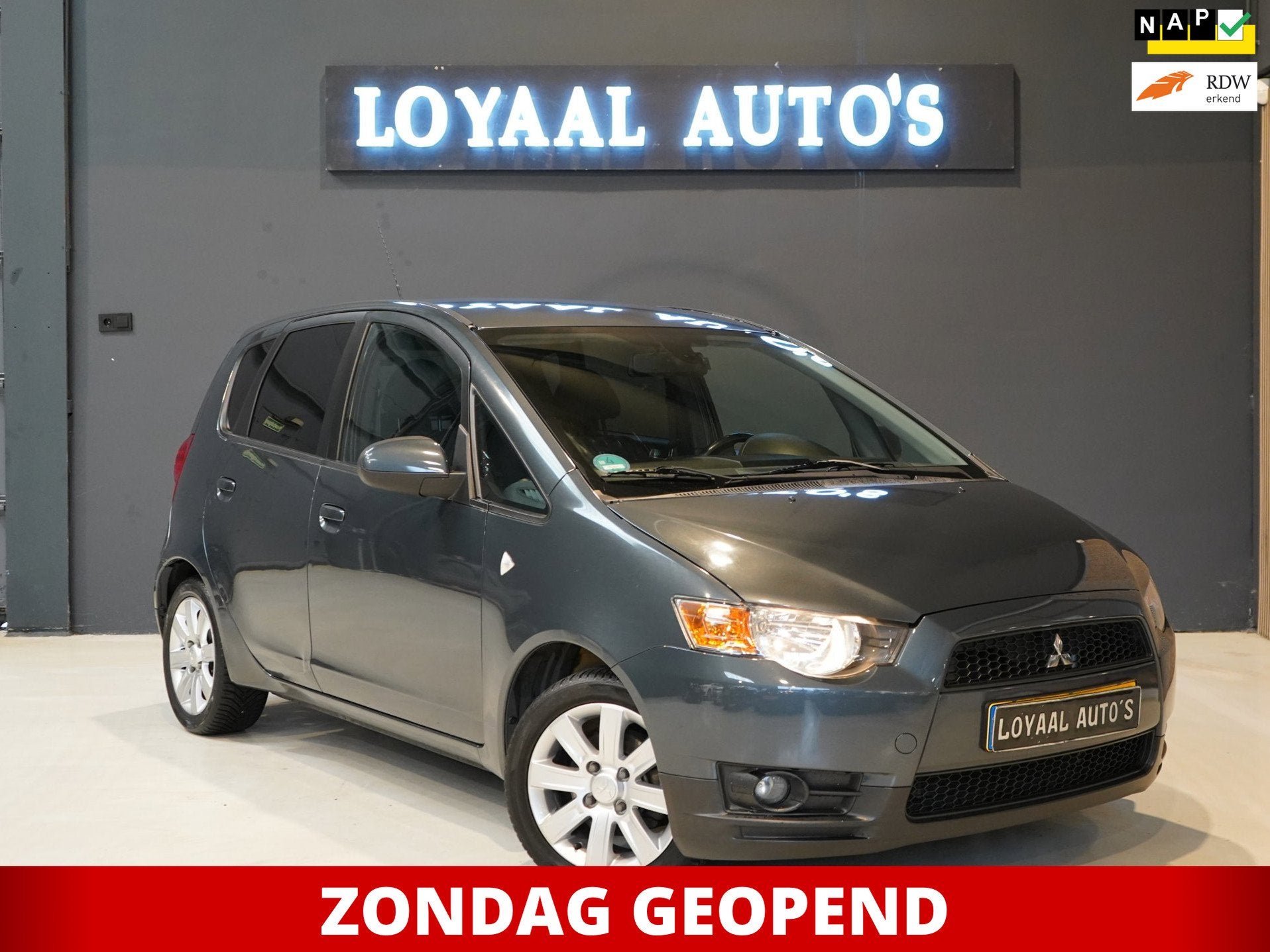 Mitsubishi Colt 1.3 Edition Two | AUTOMAAT | ACHTERUITRIJC., Auto's, Stof, Gebruikt, 31 €/maand, Colt