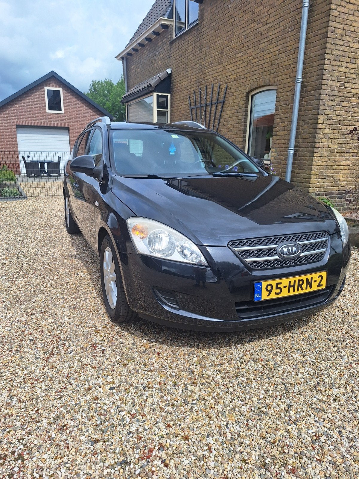 Kia (Pro) Cee d 1.6 Sporty Wagon 2009 Zwart, Auto's, Voorwielaandrijving, 1591 cc, 4 cilinders, Zwart