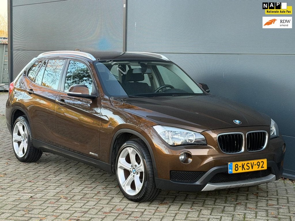BMW X1 SDrive20i Executive NAVI CLIMA CRUISE TREKHAAK, Auto's, BMW, 4 cilinders, Bruin, Origineel Nederlands, 184 pk