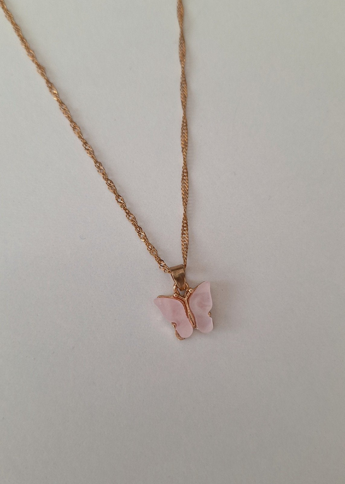 Vlinder ketting goudkleurig, Met hanger, Overige materialen, Ophalen of Verzenden, Zo goed als nieuw