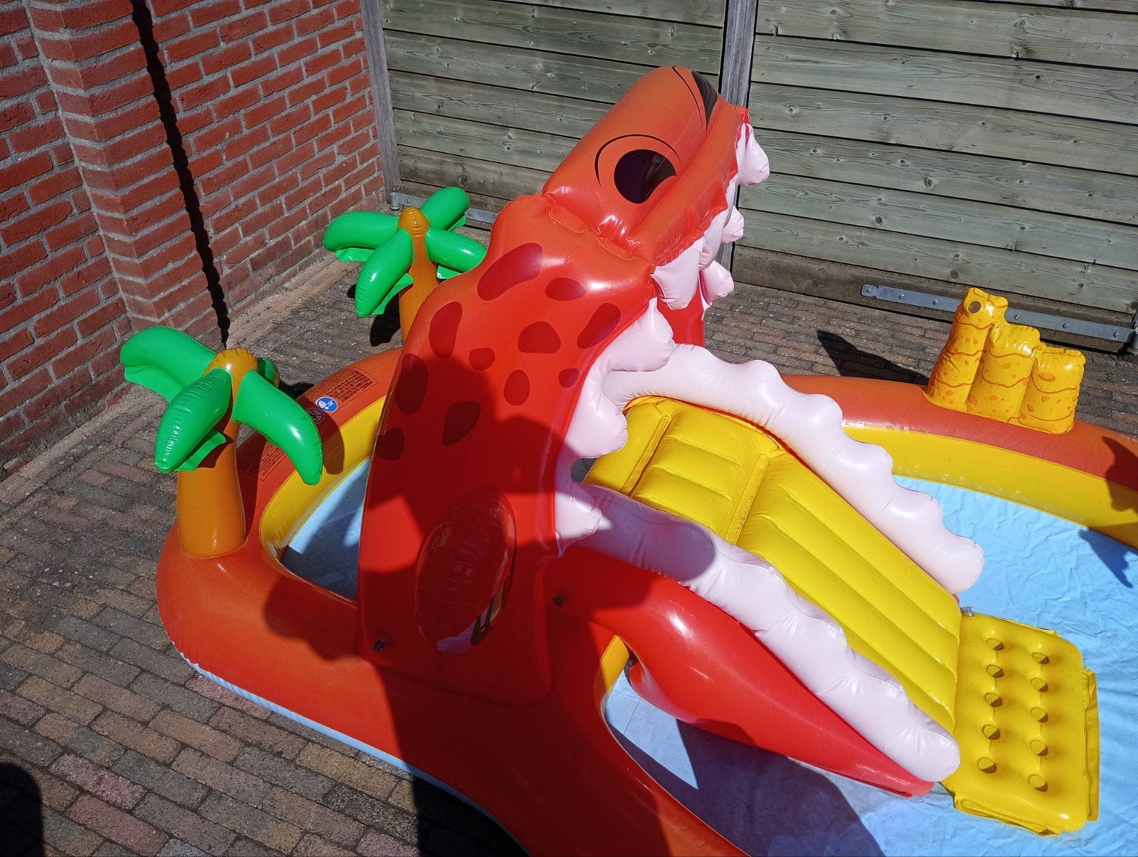 Opblaasbaar dinosaurus zwembad met glijbaan, Ophalen, Gebruikt, Opblaaszwembad, 80 tot 120 cm