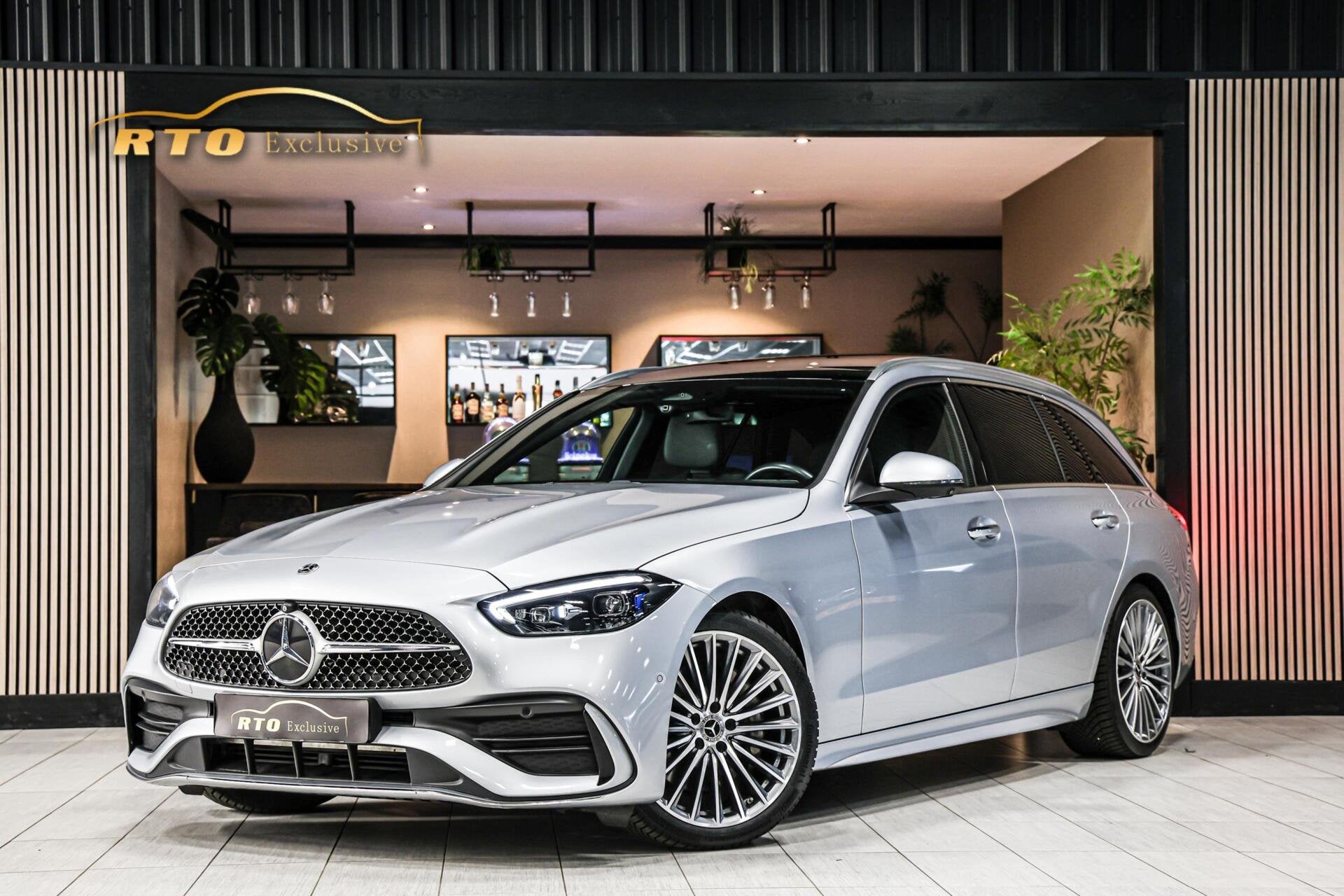 Mercedes C-klasse Estate 200 AMG|Pano|Trekh|Memory|Laser|HUD, Automaat, 4 cilinders, Met garantie (alle), Automatische klimaatregeling