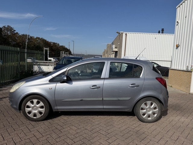 Opel Corsa 1.4-16V Enjoy APK T/M 17-11-2027, Voorwielaandrijving, Dealer onderhouden, Gebruikt, Zwart