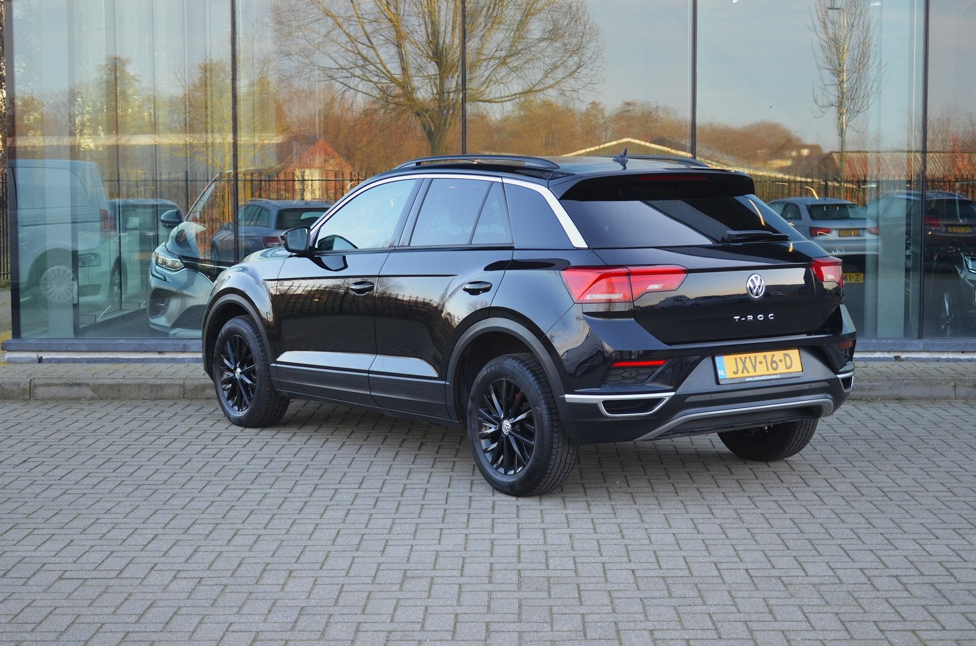 Volkswagen T-ROC 1.5 TSI Sport | Automaat | Stoelverwarming, Auto's, Volkswagen, Stof, 4 cilinders, 150 pk, Zwart