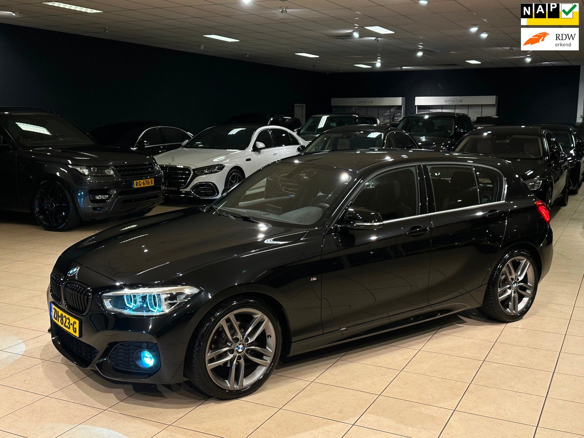 BMW 1-serie 118i High Executive/M-Sport/Leder/Automaat/Top, Gebruikt, Zwart, Bedrijf, 650 kg