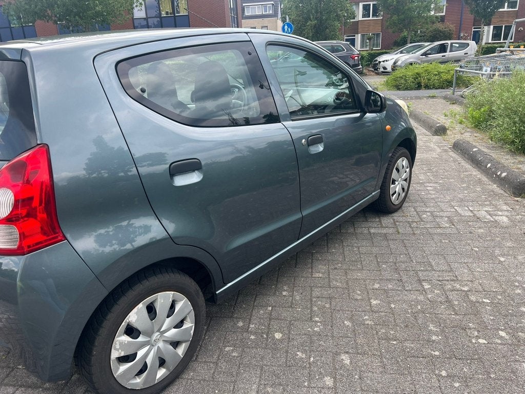 Suzuki Alto 1.0 2011 Grijs, Auto's, Voorwielaandrijving, Euro 5, Stof, 4 stoelen